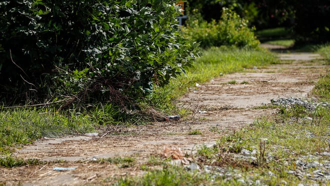 Missing sidewalk could be an environmental challenge